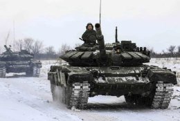 Rusija atitraukia dalį karinių pajėgų nuo Ukrainos sienos